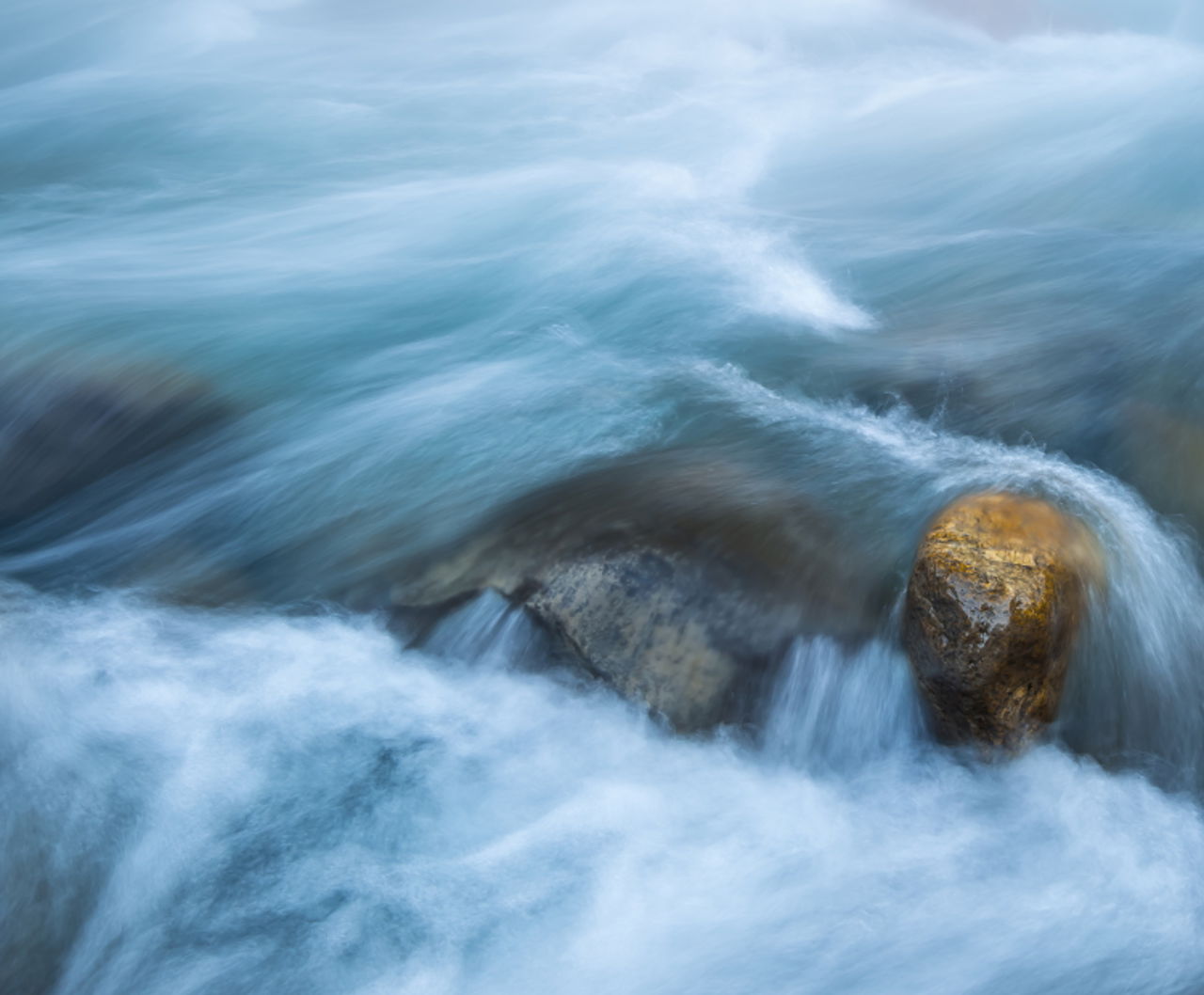 Water and golden rock